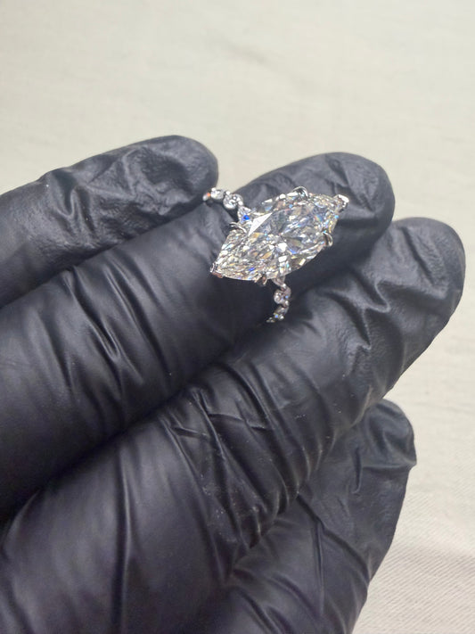 5.02Ct Marquise Diamond F VVS2 Ring, 18k White Gold with additional IGI certified Diamonds on Band